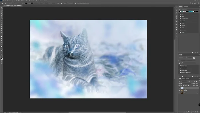 Inverti il livello centrale (Ctrl+I) e imposta il metodo di fusione su "Luce Vinda". L'immagine diventerà grigia.