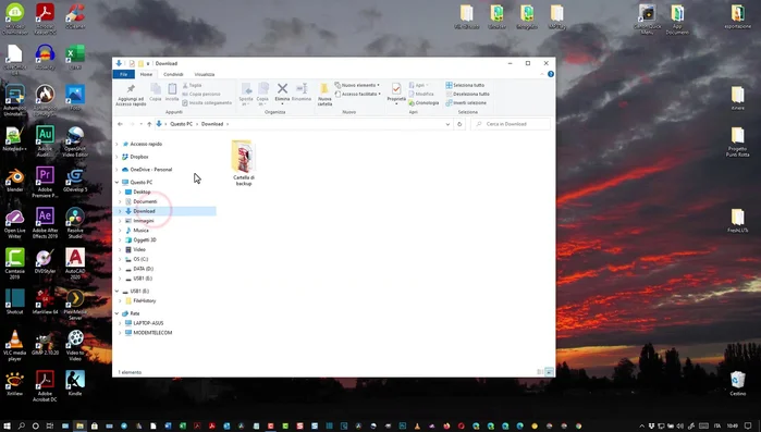 Scegliere la versione desiderata e selezionare se ripristinare nella cartella originale o in una nuova cartella.