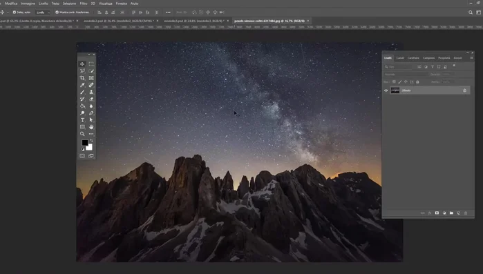 Creare una maschera di ritaglio per il livello del paesaggio, in modo che sia visibile solo all'interno della selezione del soggetto.