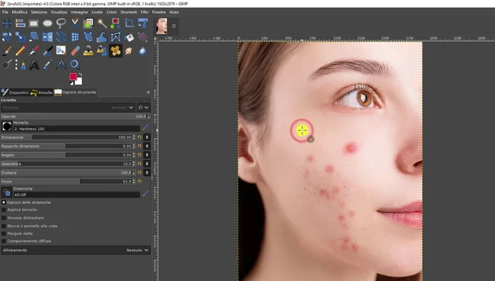 Tenere premuto Ctrl e cliccare su un'area della foto senza imperfezioni per campionare il colore.