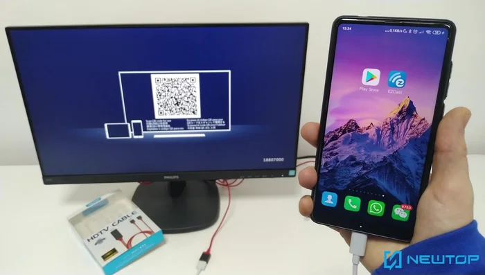 Accendere lo smartphone e il monitor/TV.